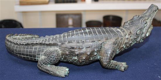 A large 20th century bronze model of a crocodile, 15.5in.